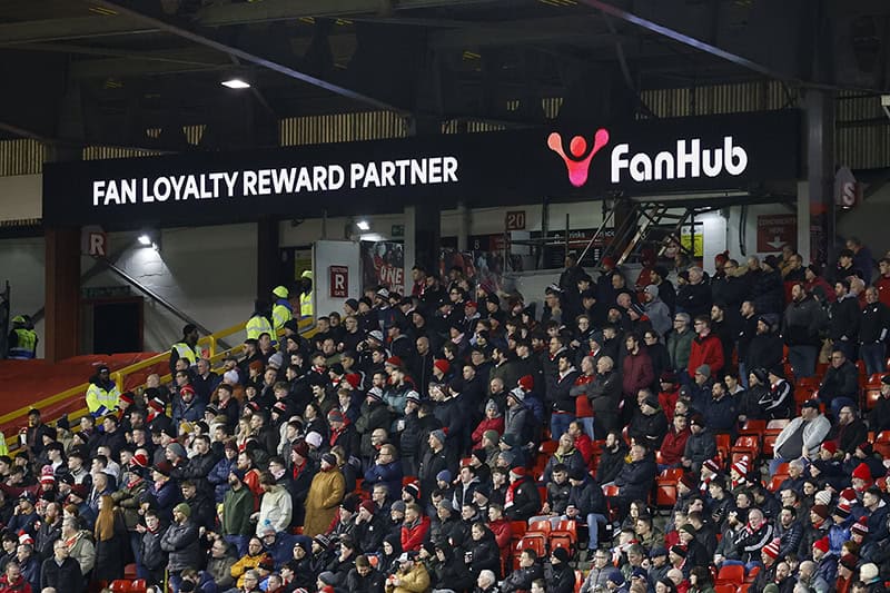 FanHub advertising board at a football stadium